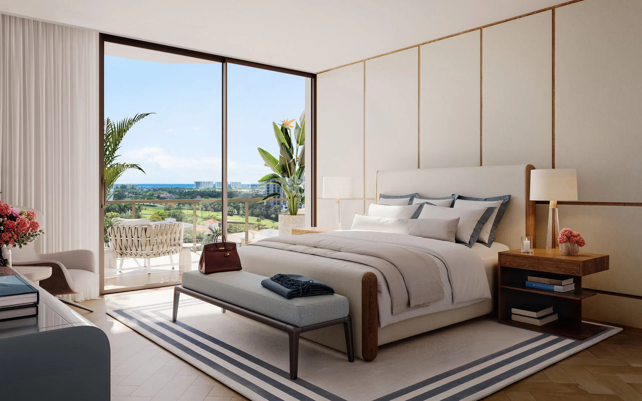 Primary bedroom with a white bed and a private balcony overlooking Downtown Boca Raton.