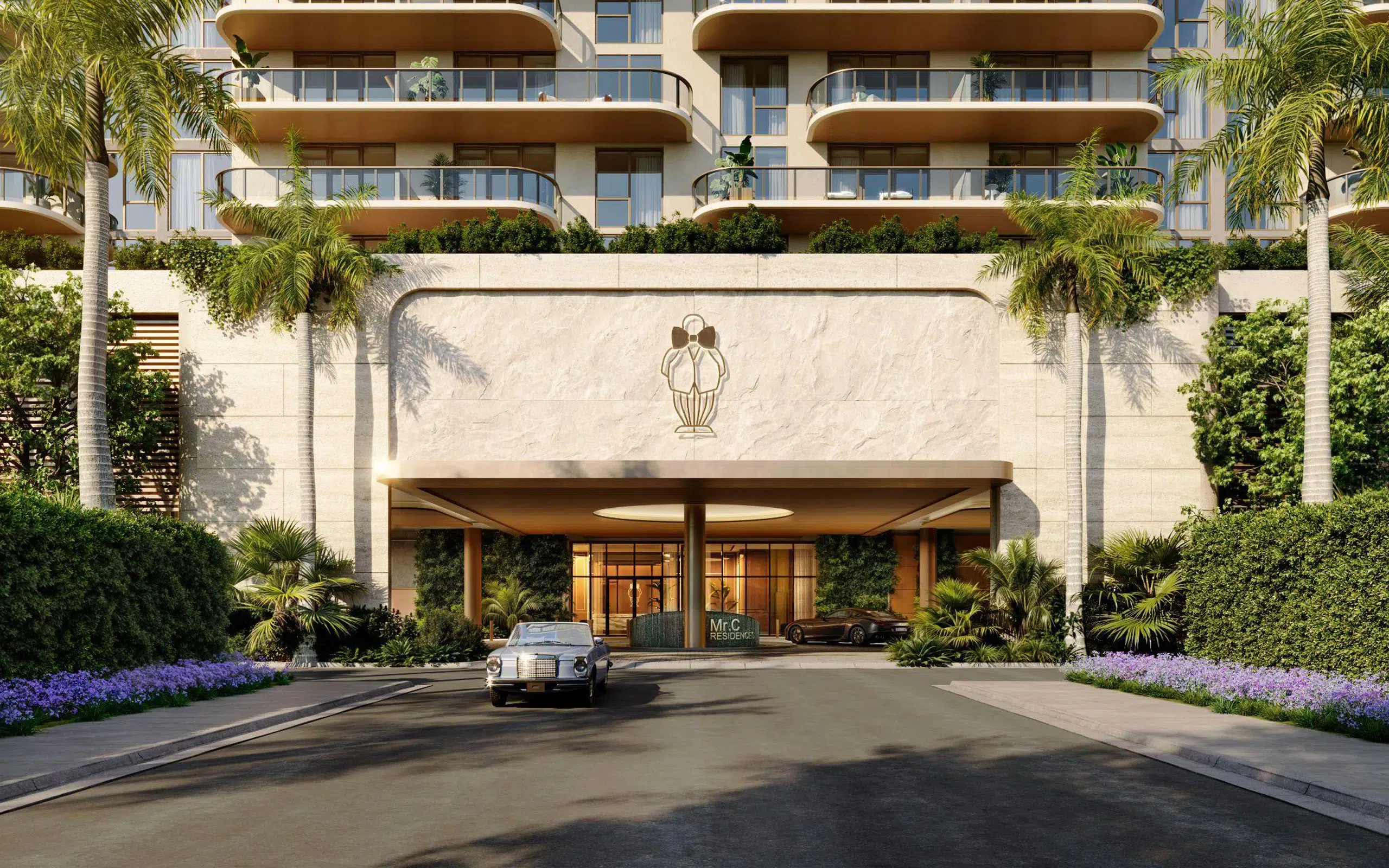 Entrance and stone logo wall at Mr C's downtown Boca Raton condos